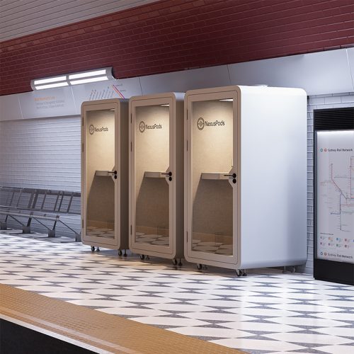 Three one-person Nexus Pods Solo soundproof booths placed side by side in a train station, offering passengers a private space for phone calls and enhanced productivity while waiting.