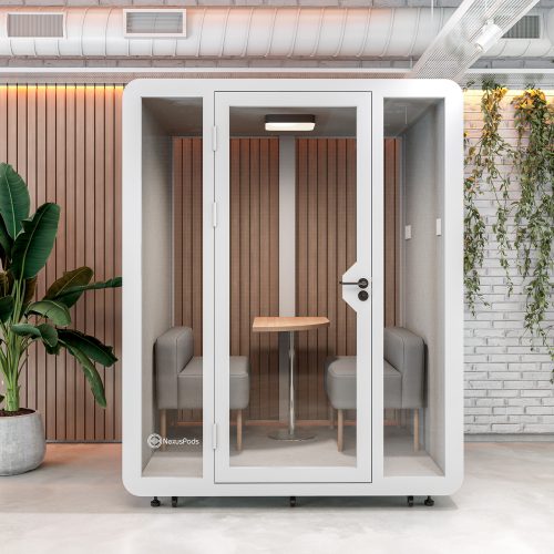 Quad Booth soundproof pod in an office setting, ideal for team meetings, brainstorming, and focused collaboration.