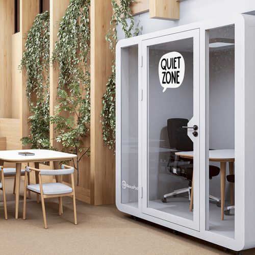 One 2-person Duo soundproof booth inside a campus, placed next to a common area with a 'quiet zone' sign displayed.