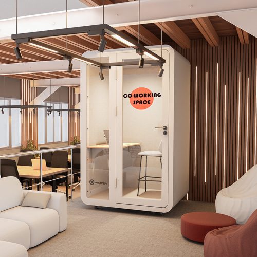 One Nexus Pods solo-plus soundproof booth positioned in an office next to a common gathering area, offering a private and productive space for phone calls or focused work.